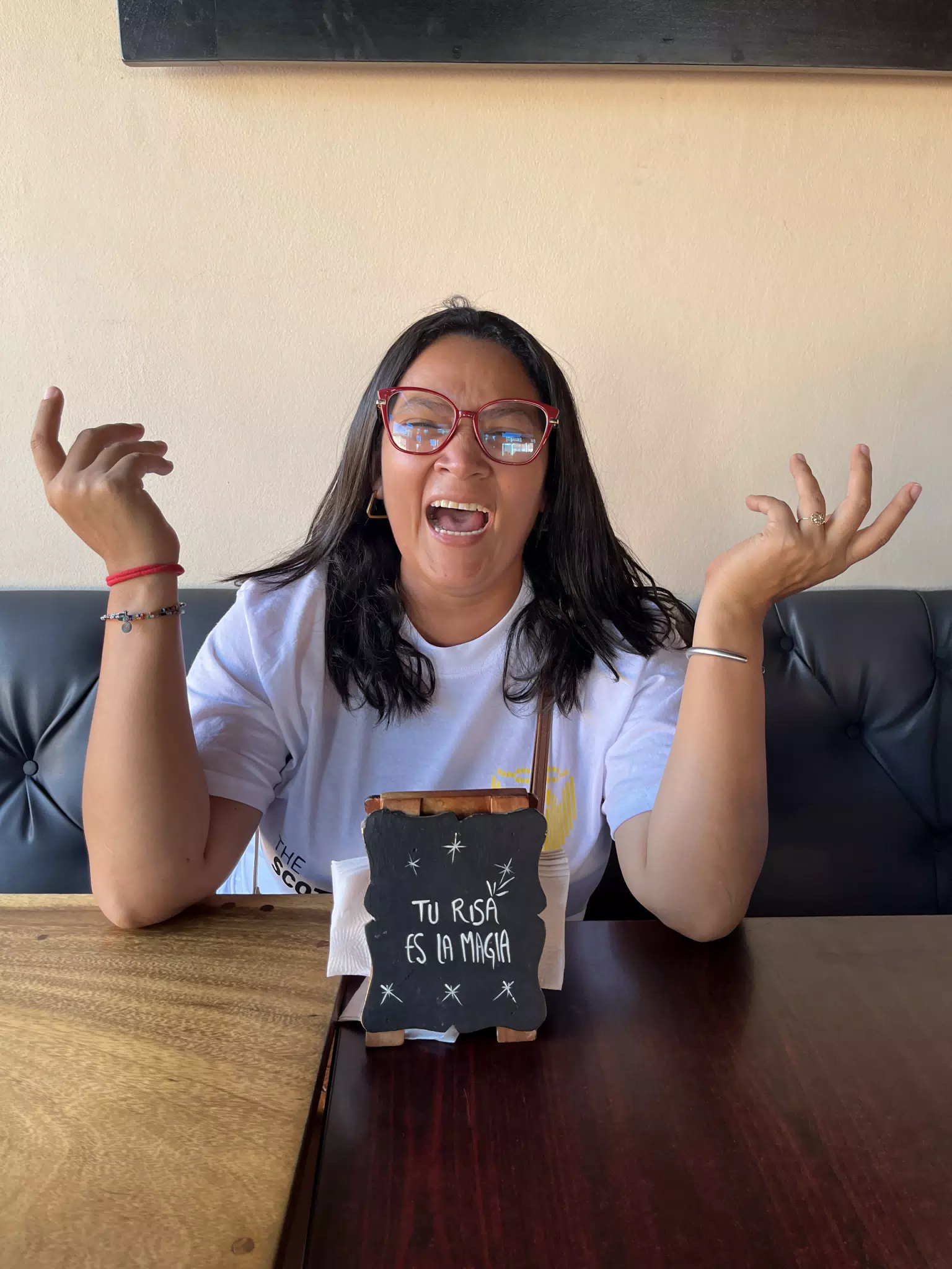Marcela Laughing at Cafe Alicia in Jinotepe, Nicaragua