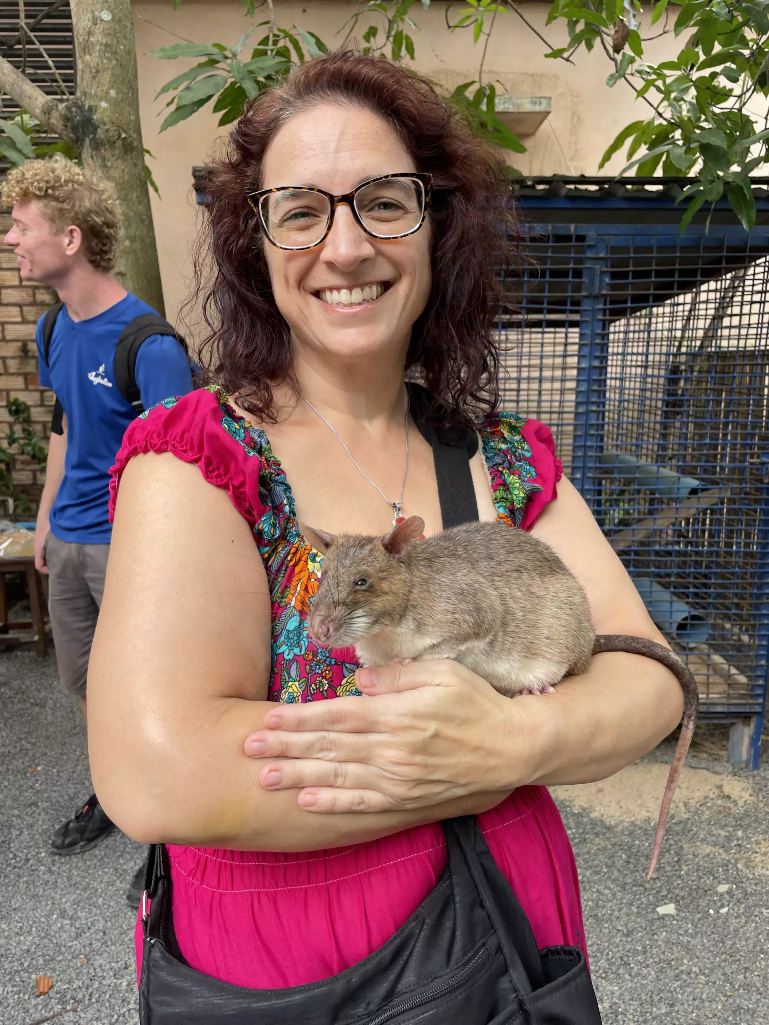 Dominica Holding a Giant Mine Sniffing Rat