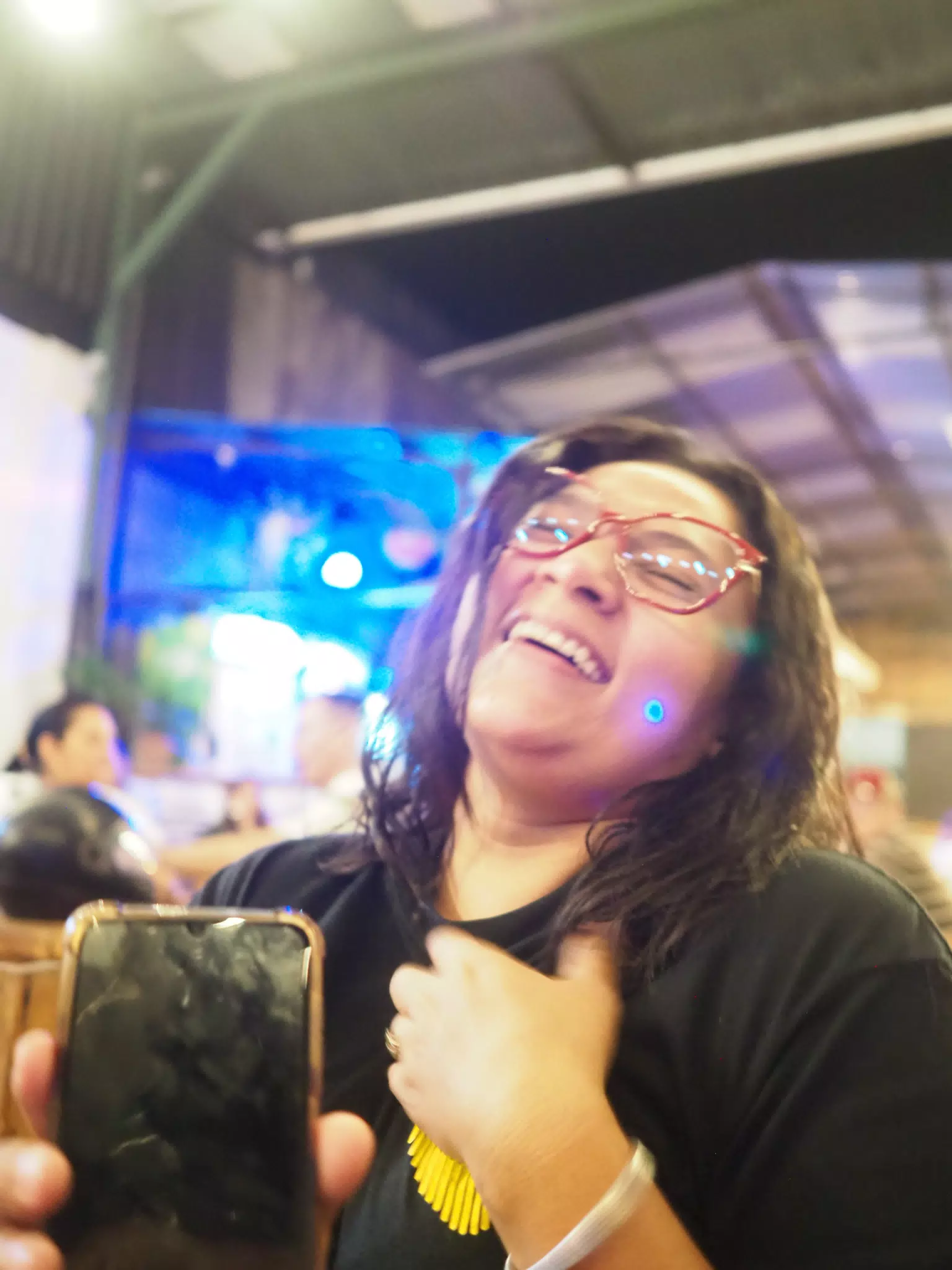 Marcela Laughing at Food Rock Ave, Leon, Nicaragua
