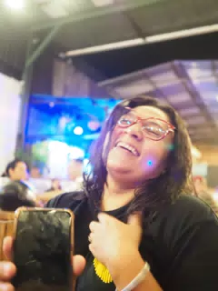 Marcela Laughing at Food Rock Ave, Leon, Nicaragua
