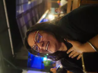 Marcela Laughing at Food Rock Ave, Leon, Nicaragua