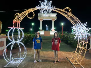 Luciana & Liesl with the Christmas Lights at Ruben Dario Park