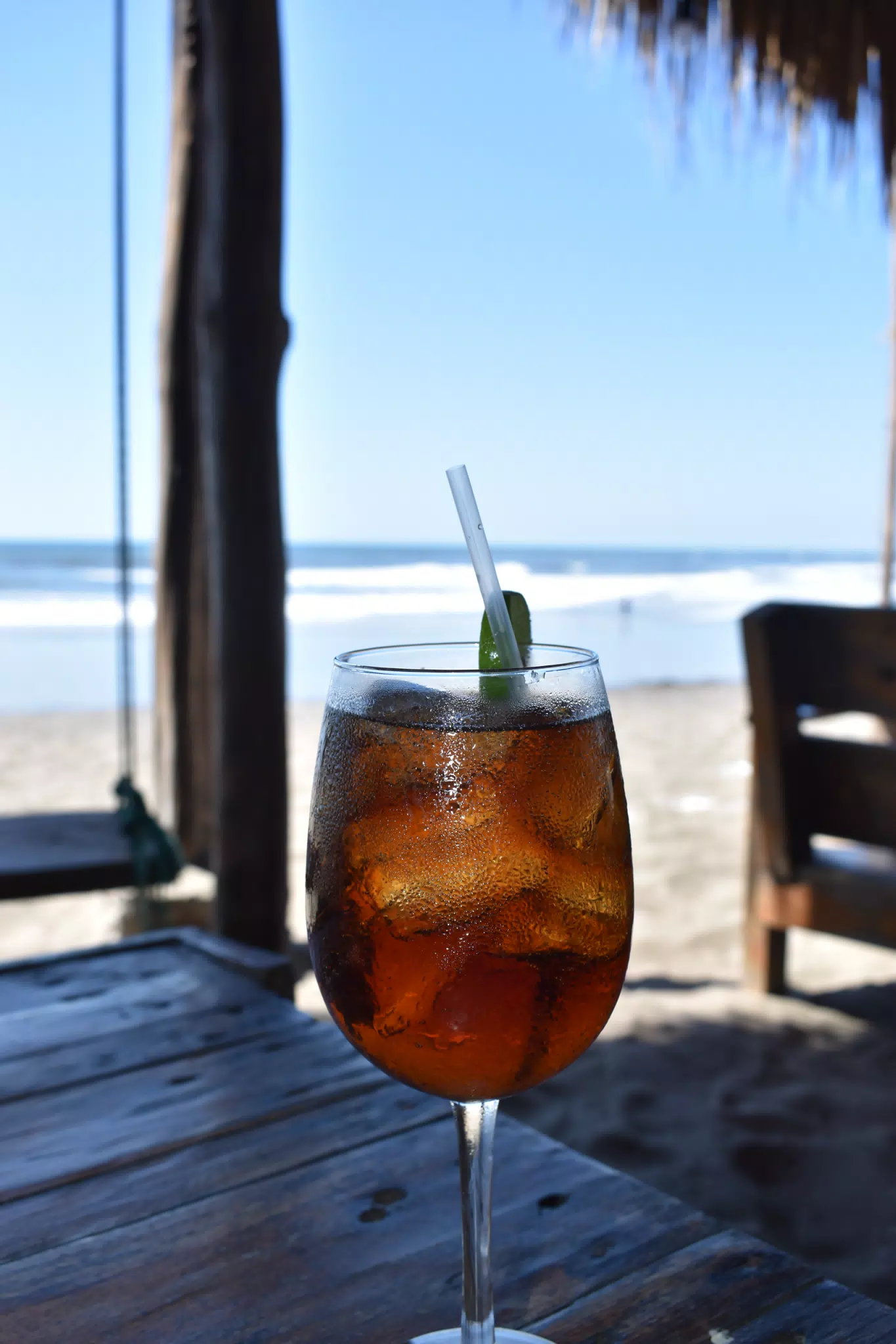 Nica Libre, a rum and coke on the beach at the Simple Beach Lodge