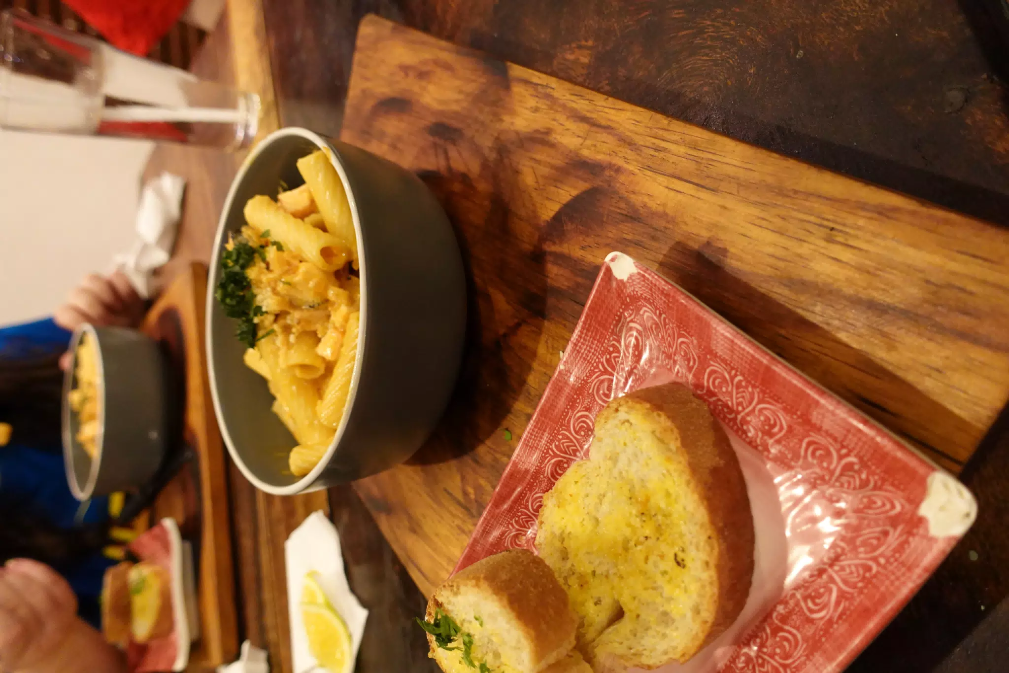 Salmon Pasta with Garlic Bread at SUA León Nicaragua