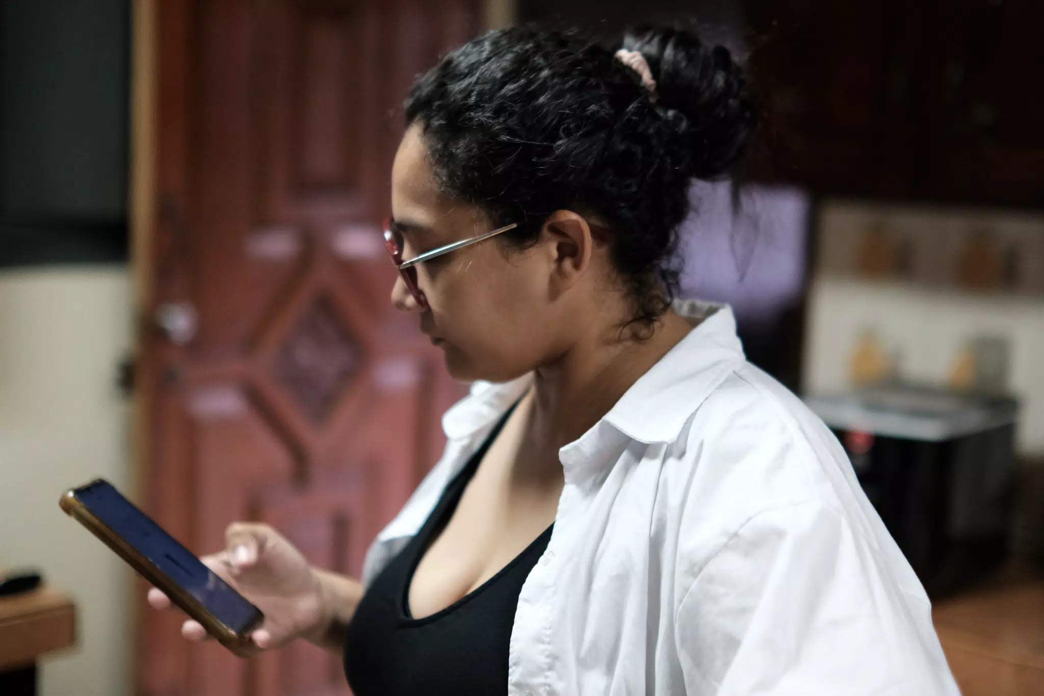 Marcela Checking Her Phone