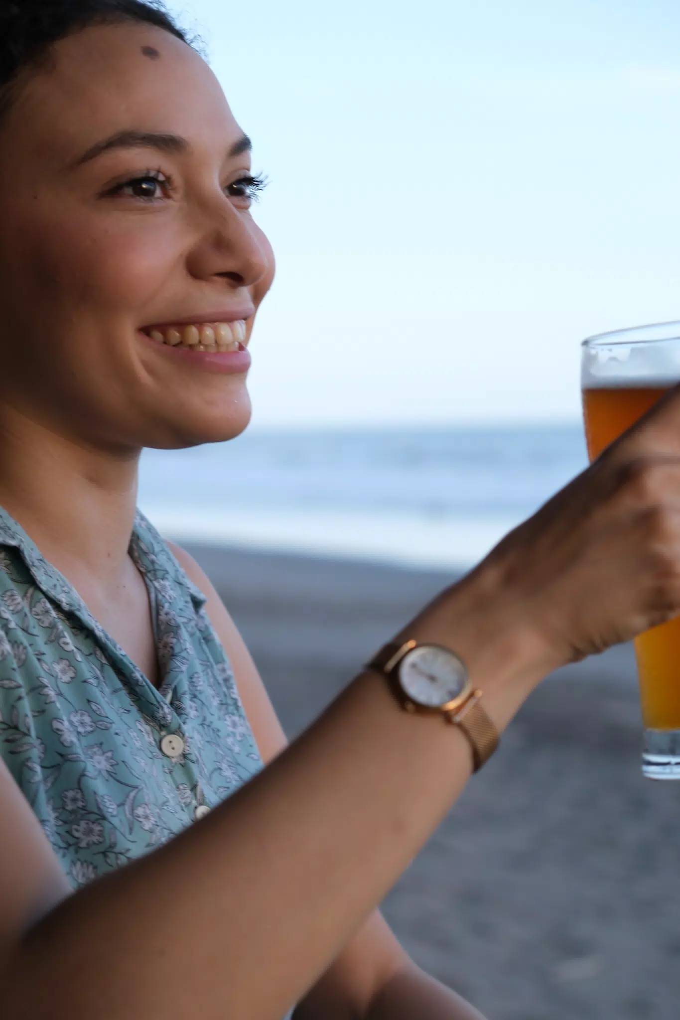 Cheers with beer on the beach