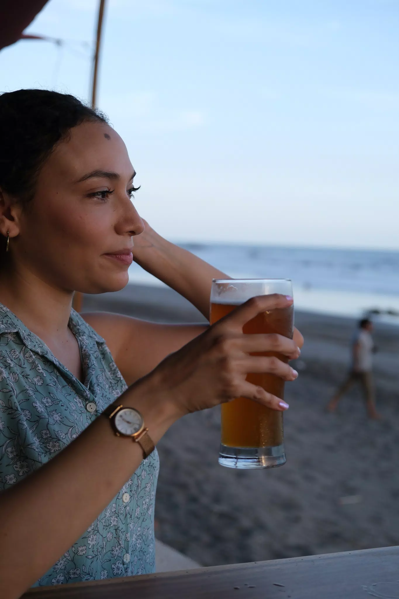 Isabel with a Beer on the Beach