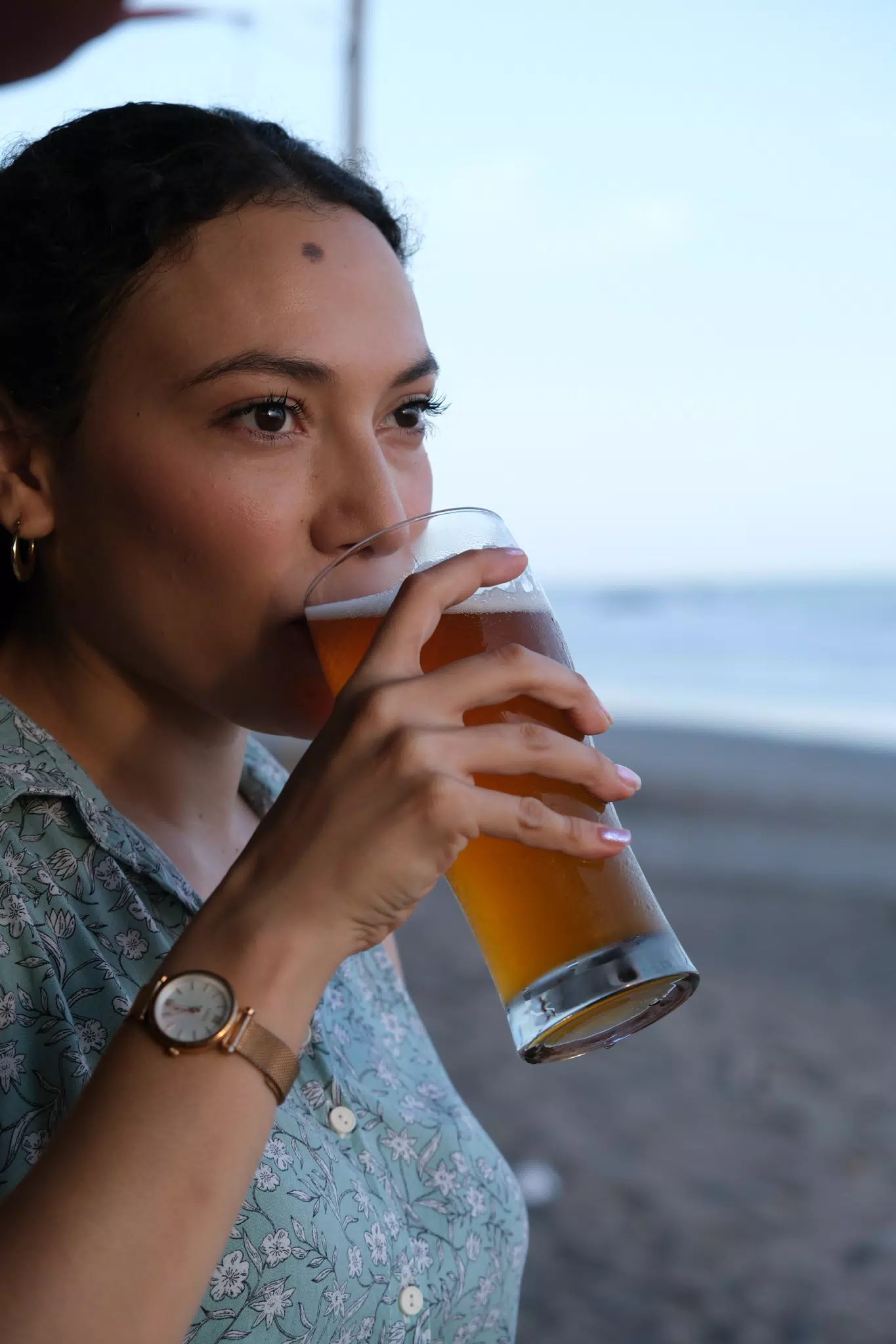 Isabel with Beer on the Beach