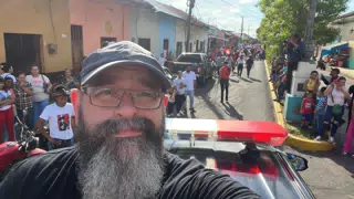 Riding the Police Truck in the Parade