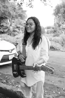 Marcela with Guitar