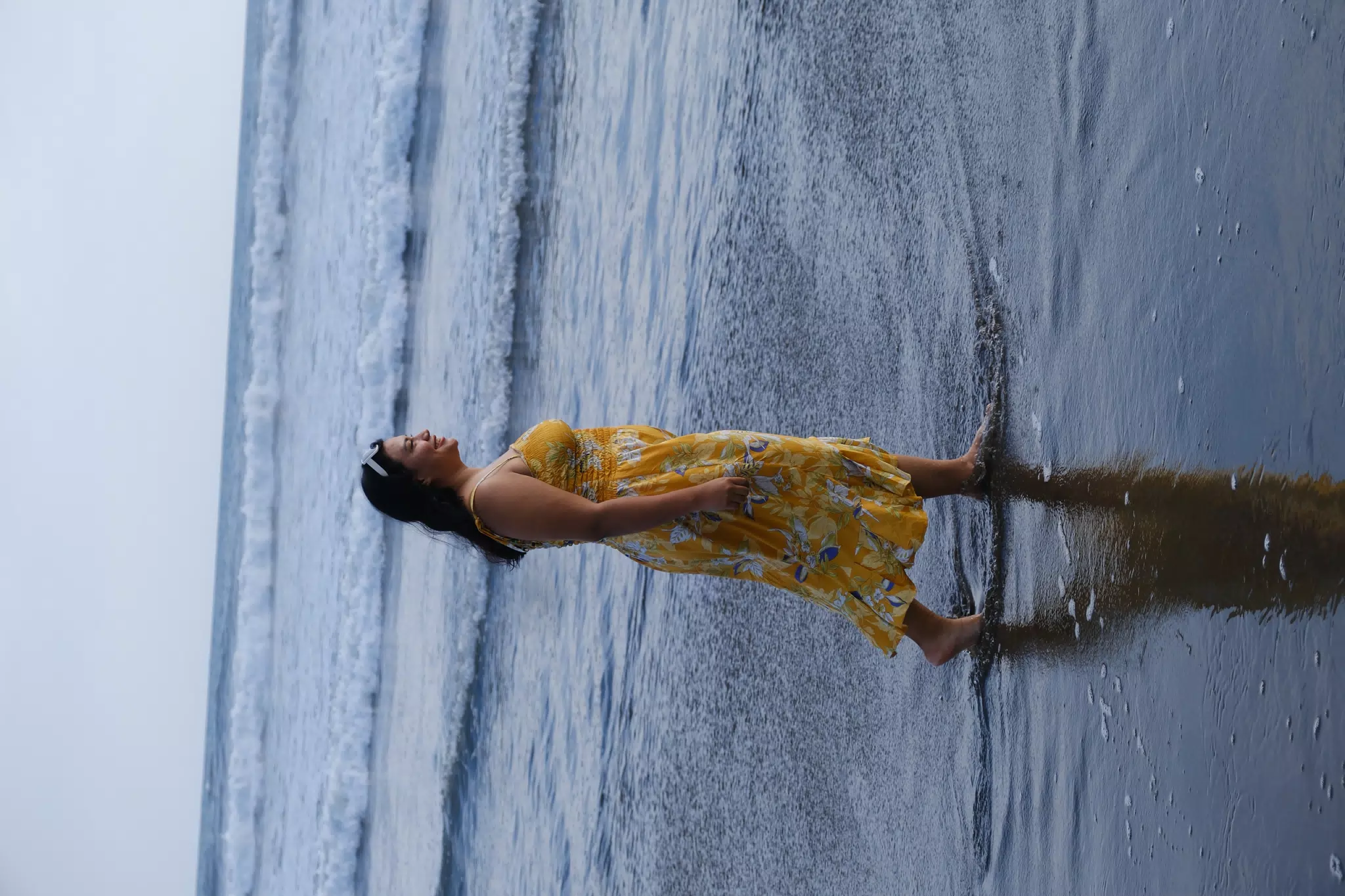 Eva Walking on the Beach
