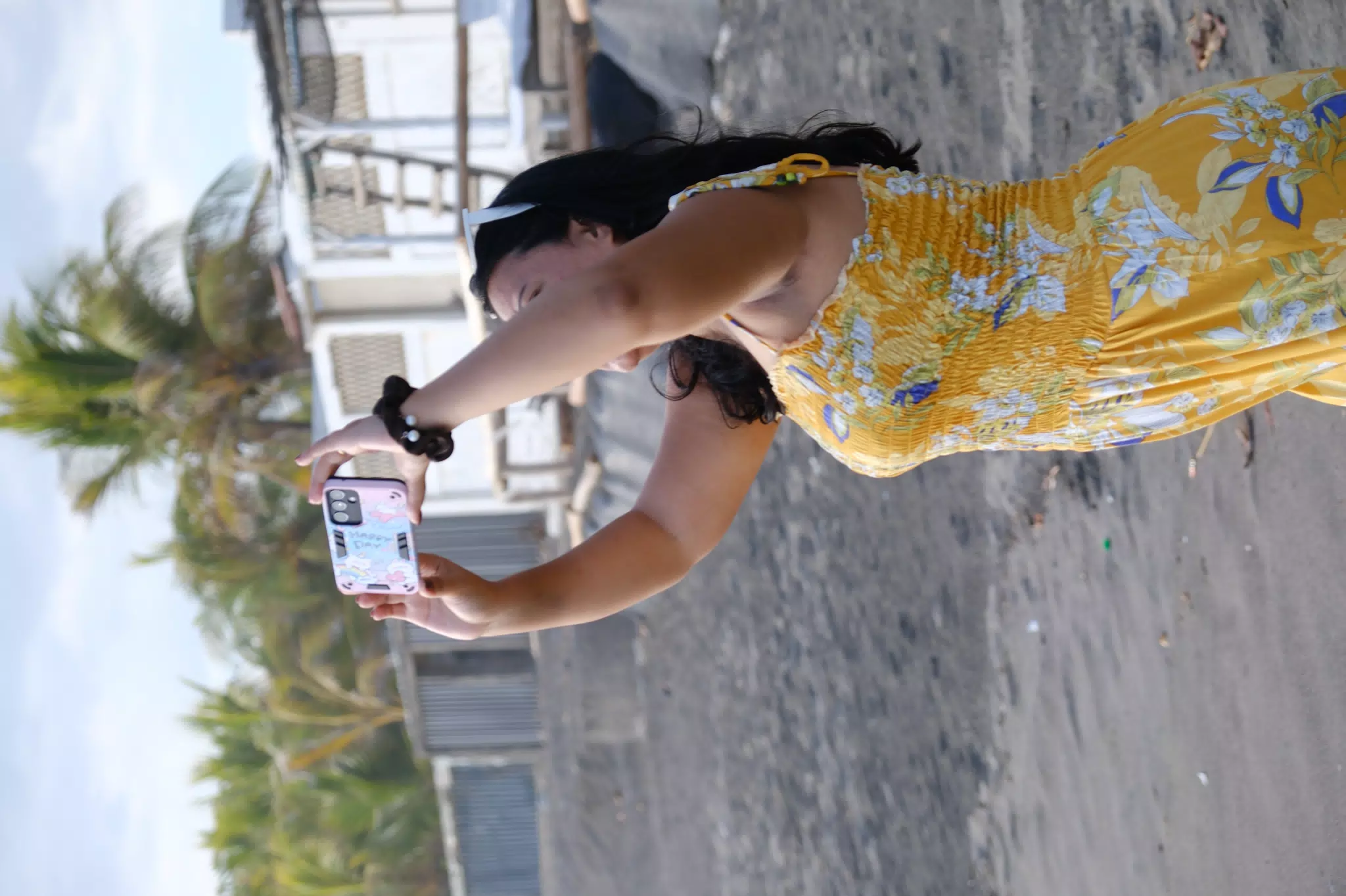Eva Filming the Sunset on Las Peñitas, Nicaragua