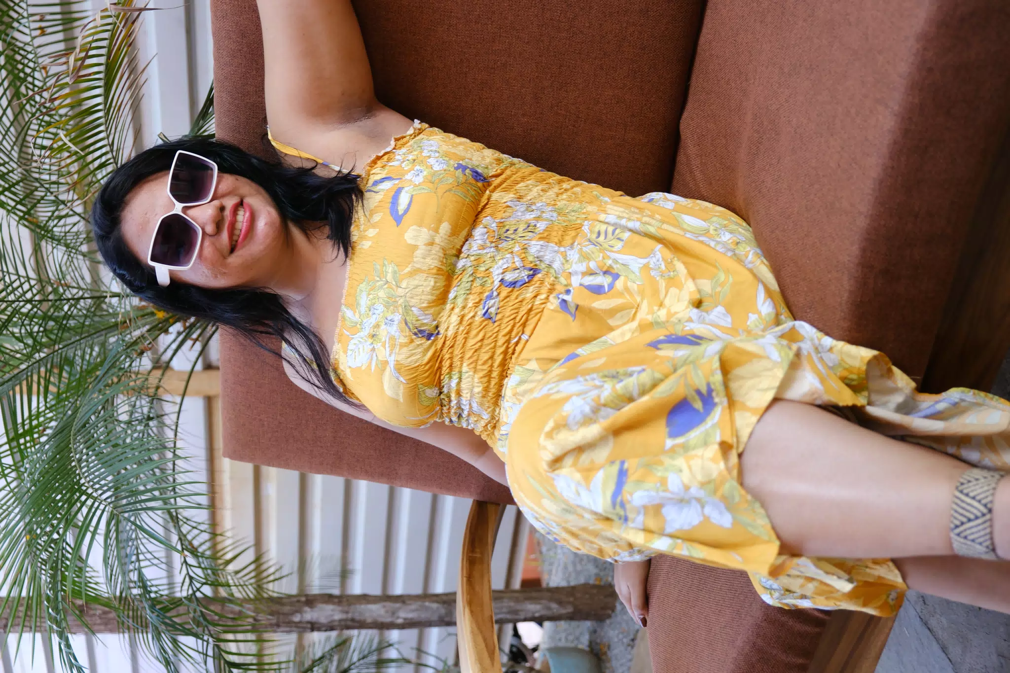 Eva in Sunglasses on Sofa
