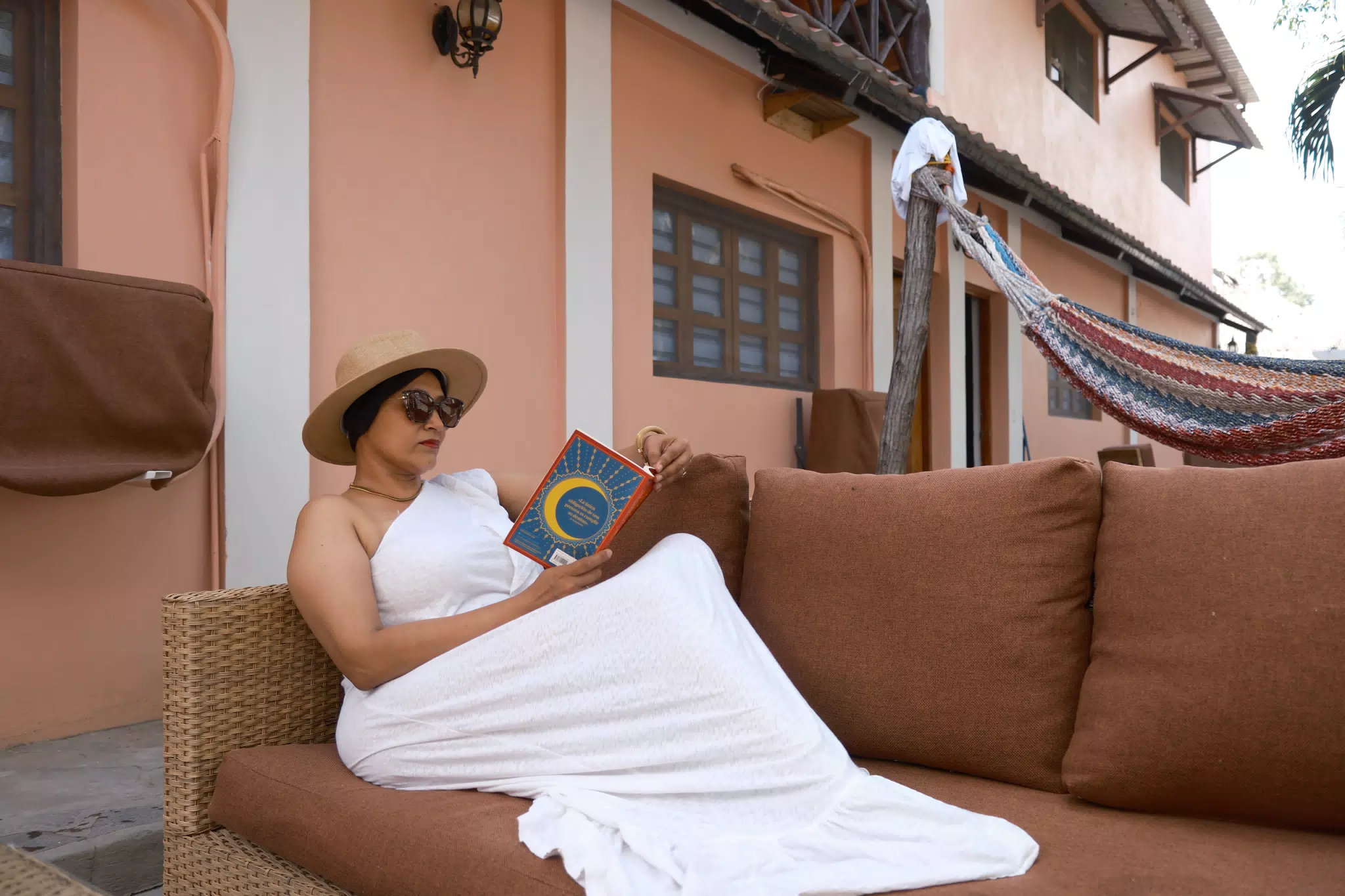 Marcela Reading a Book in White Dress at El Escondite