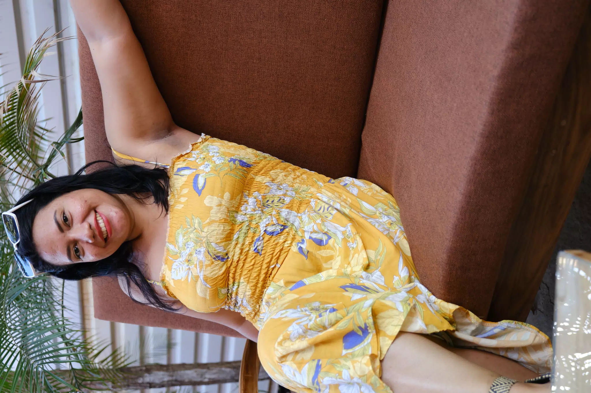 Eva on Sofa Outdoors in Yellow Dress in Nicaragua