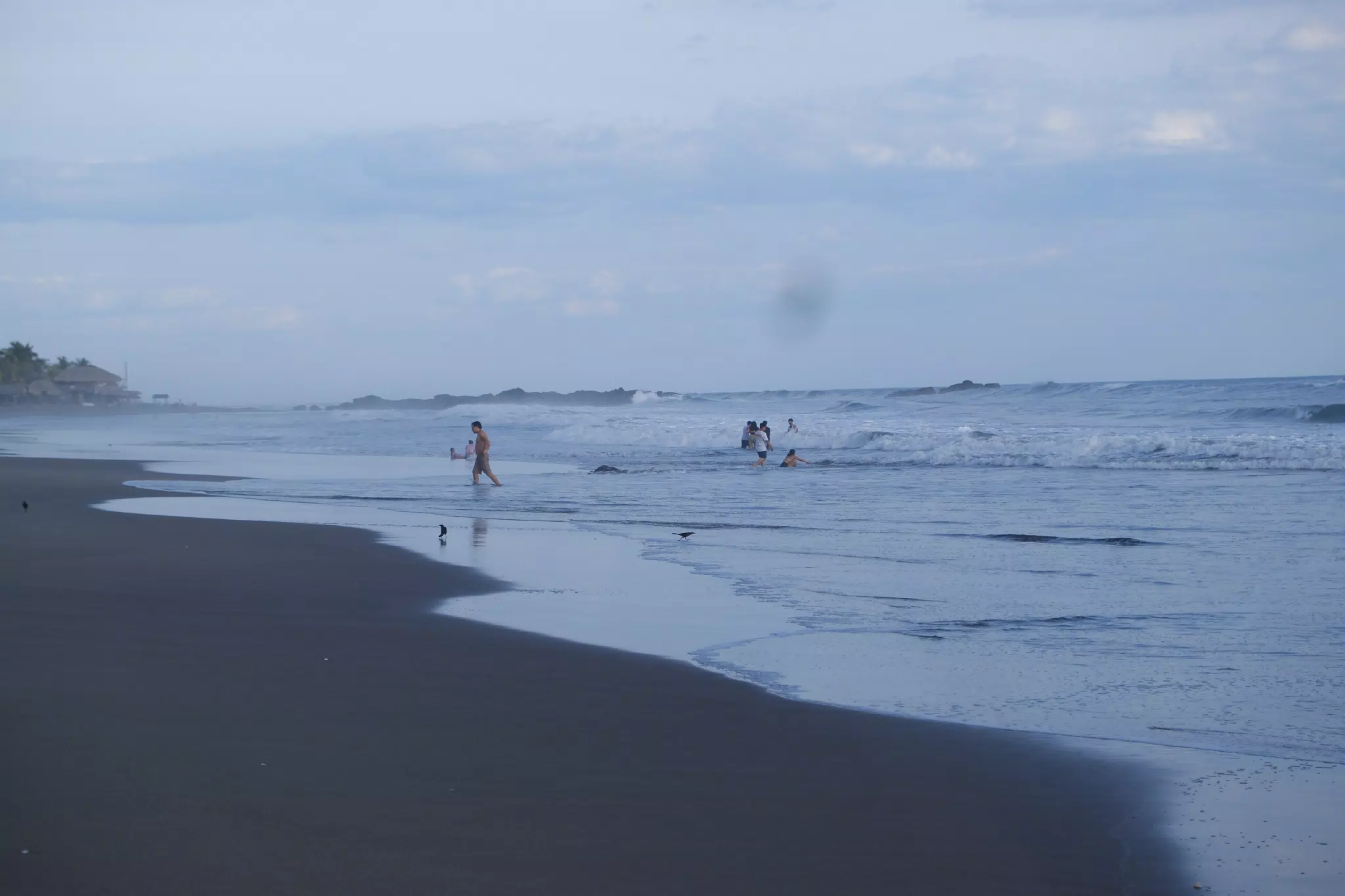People in the Surf on Playa Las Peñitas Looking South, Nicaragua