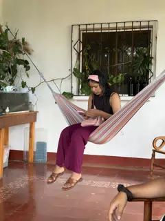 Marilyn Using Phone on Hammock