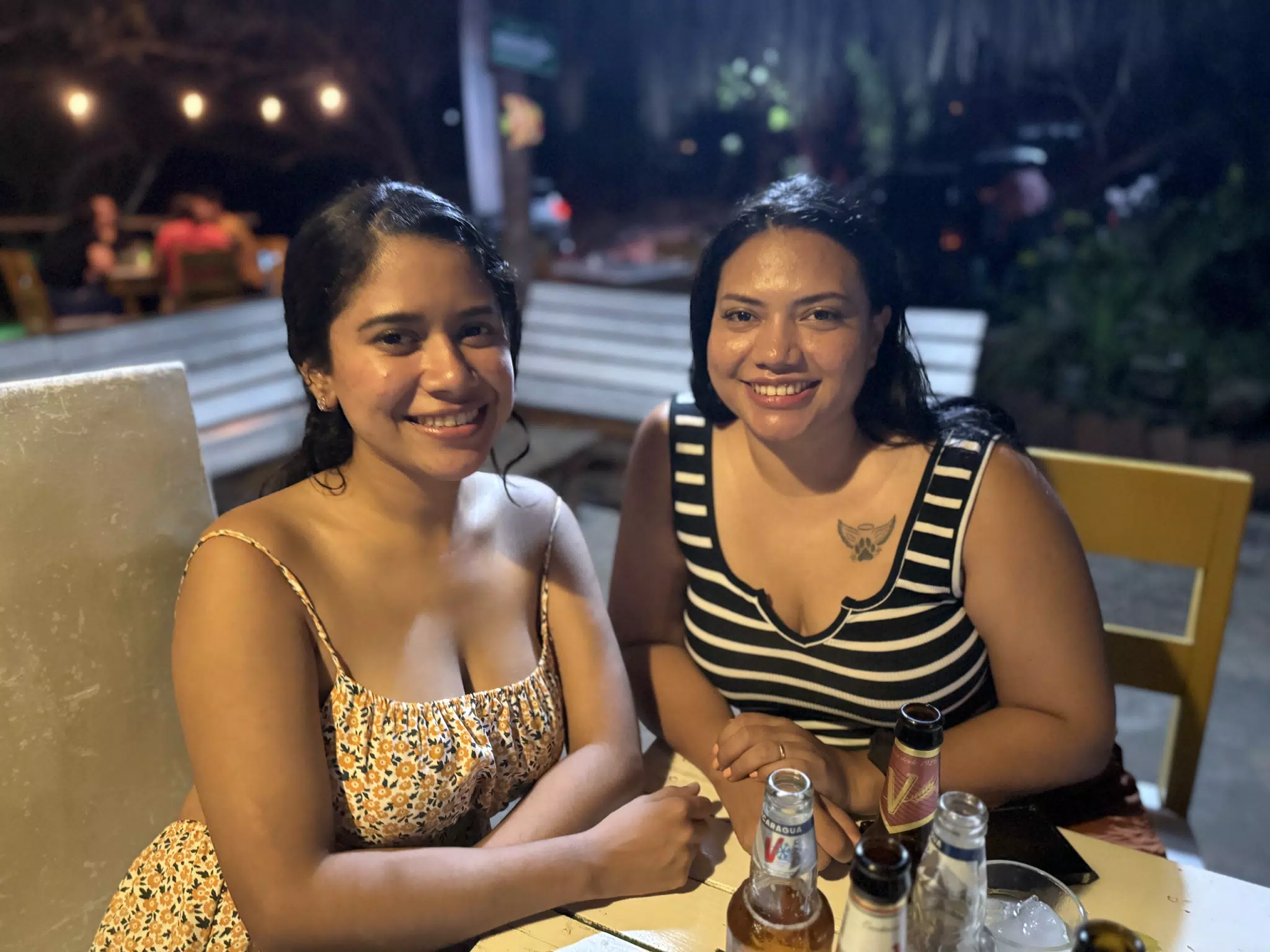 Marilyn & Eva at Dinner with Beer at Chelitos Nicaragua