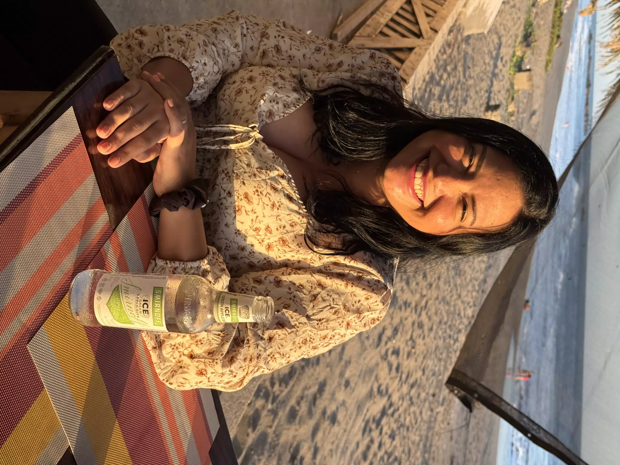 Eva with a Smirnoff on the Beach at Desperados