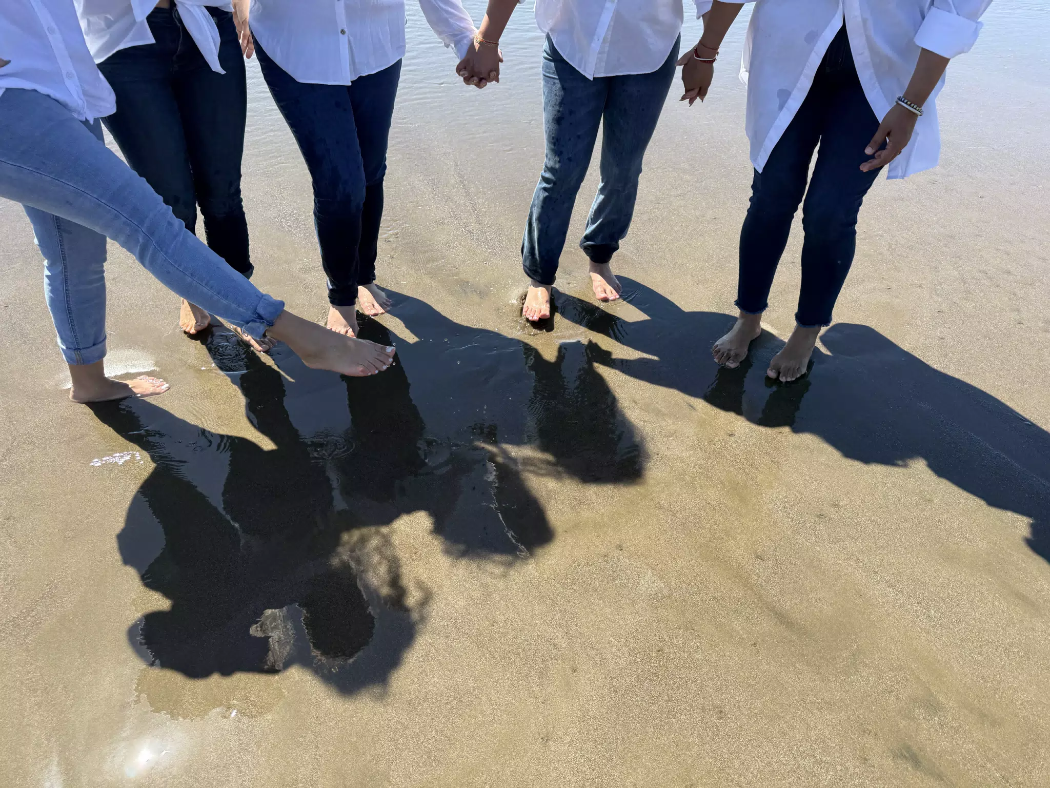 The Girls Feet on the Beach
