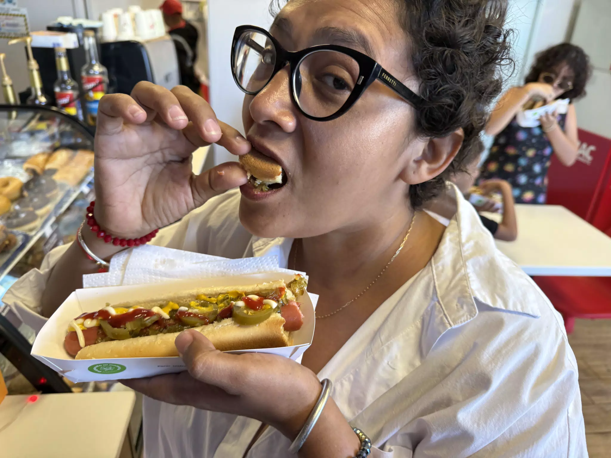 Marcela with Hot Dog at Super7 in El Crucero, Nicaragua