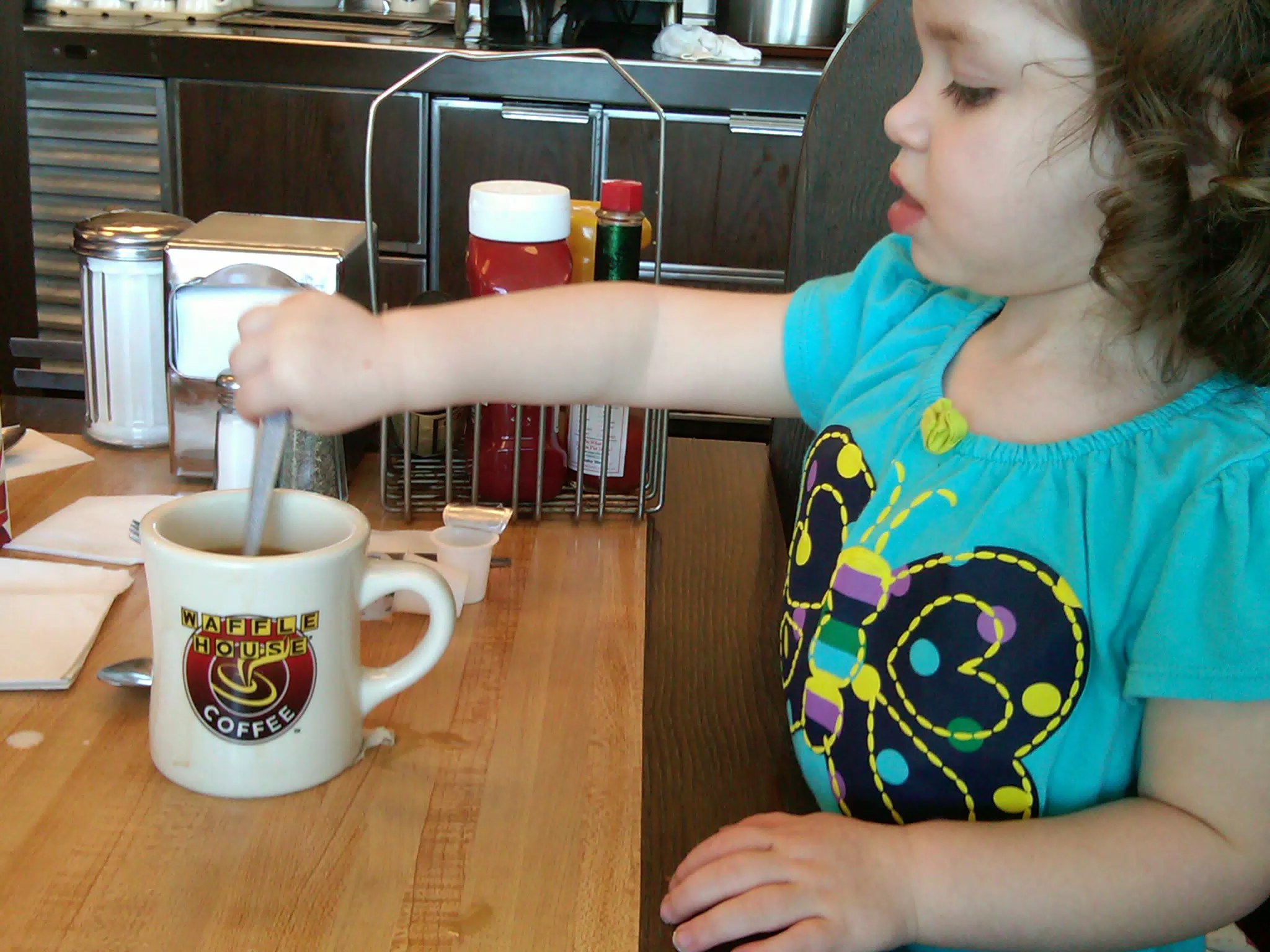 Liesl drinking Coffee at Waffle House