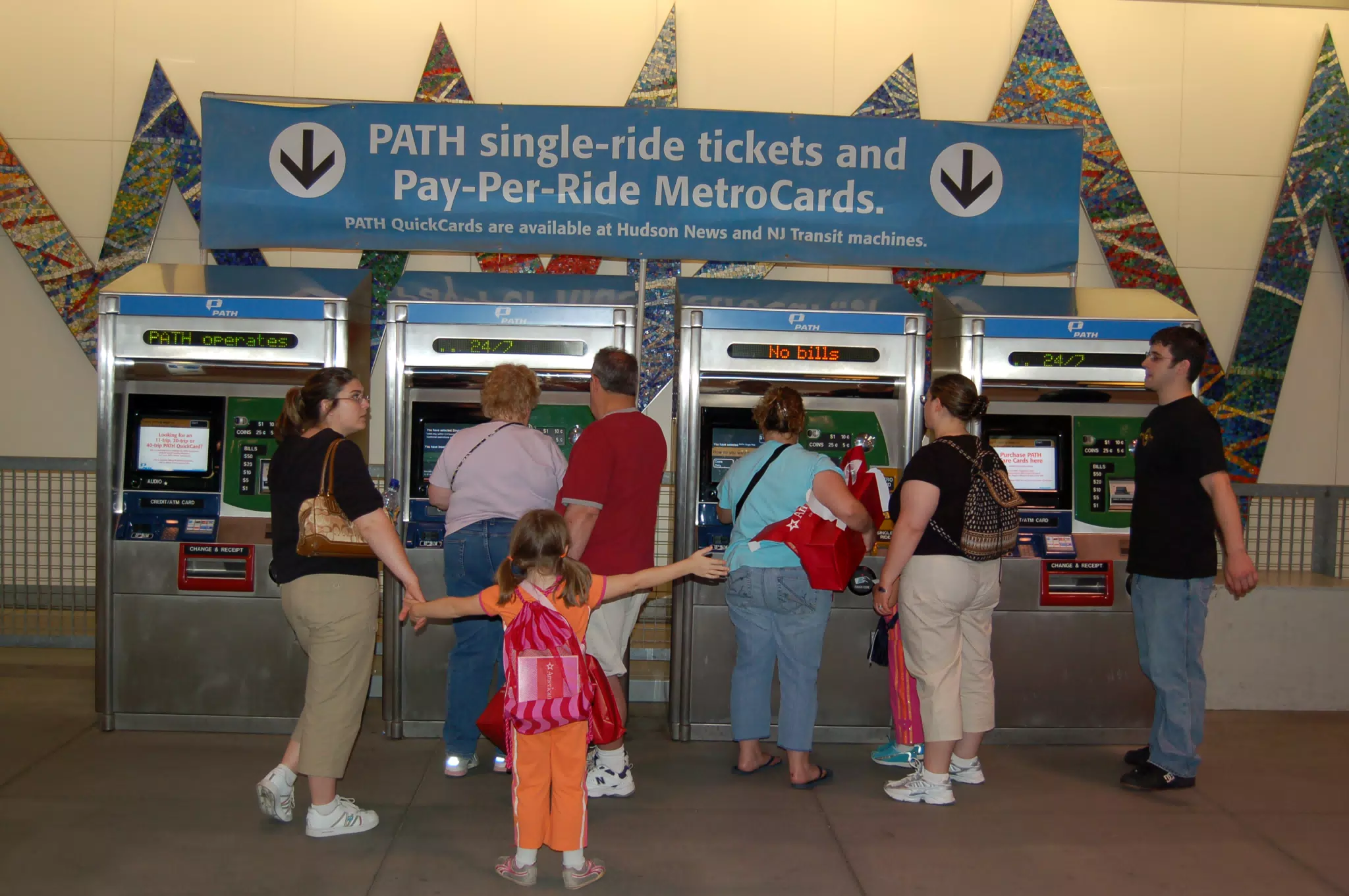 The Toccos Buying Train Tickets