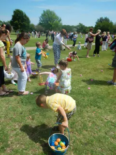 Garrett and Liesl Collecting Easter Eggs