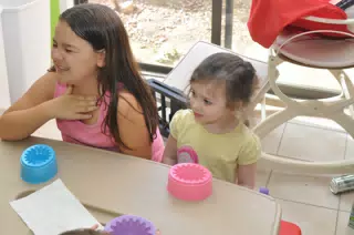 Emily and Liesl Preparing to Colour Easter Eggs