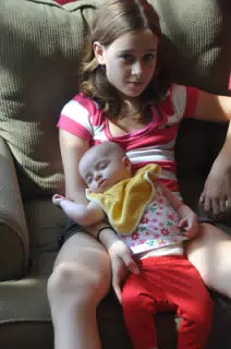 Madeline Holding Luciana