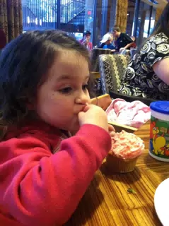 Liesl Eating a Cupcake