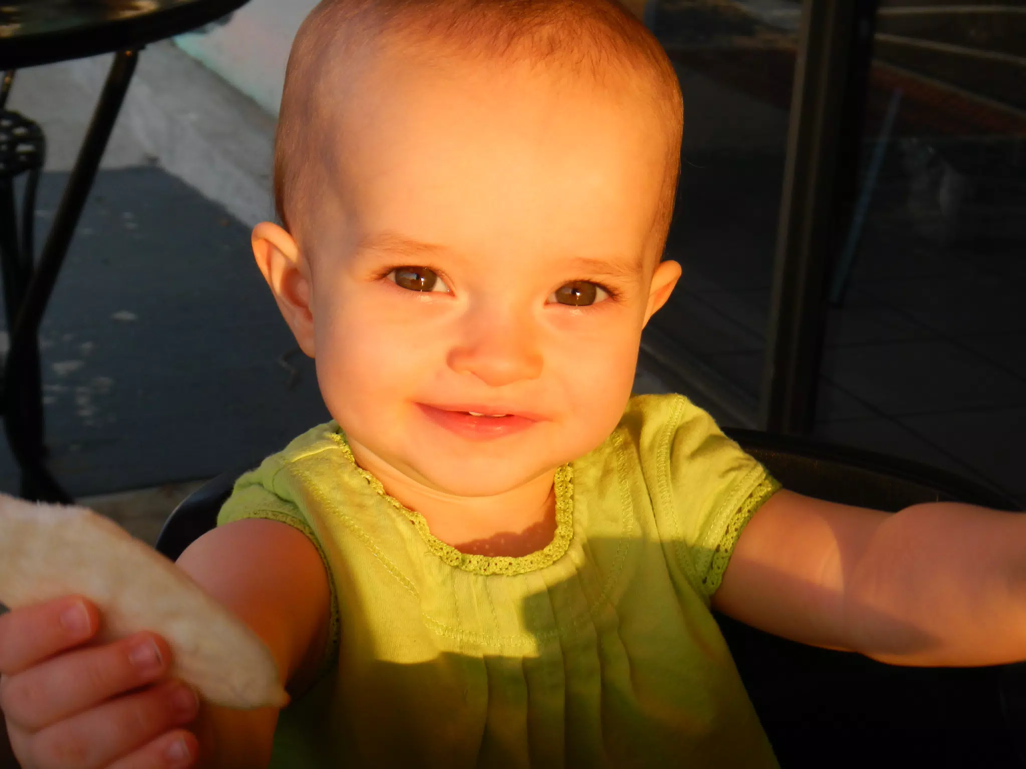 Luciana Eating a Banana Num Num at the Cafe