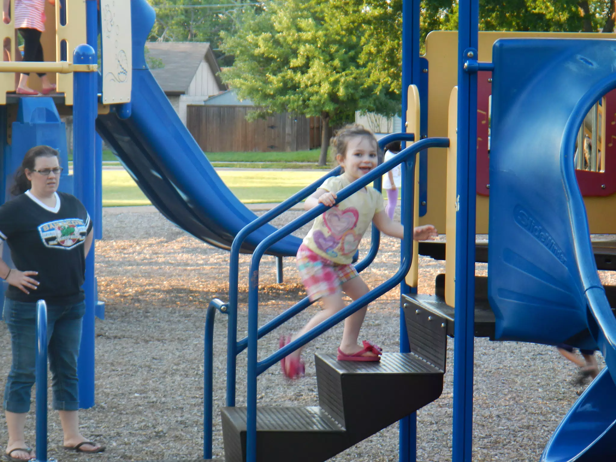 Liesl Climbing to the Slide
