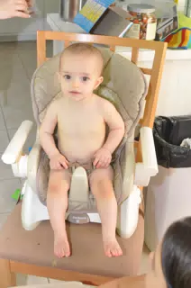 Luciana in Her High Chair