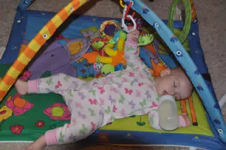 Luciana Asleep on Her Mat