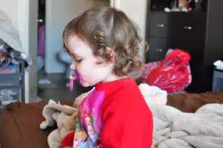 Liesl Sitting on the Bed