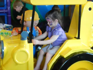 Liesl Riding the Bob the Builder Ride