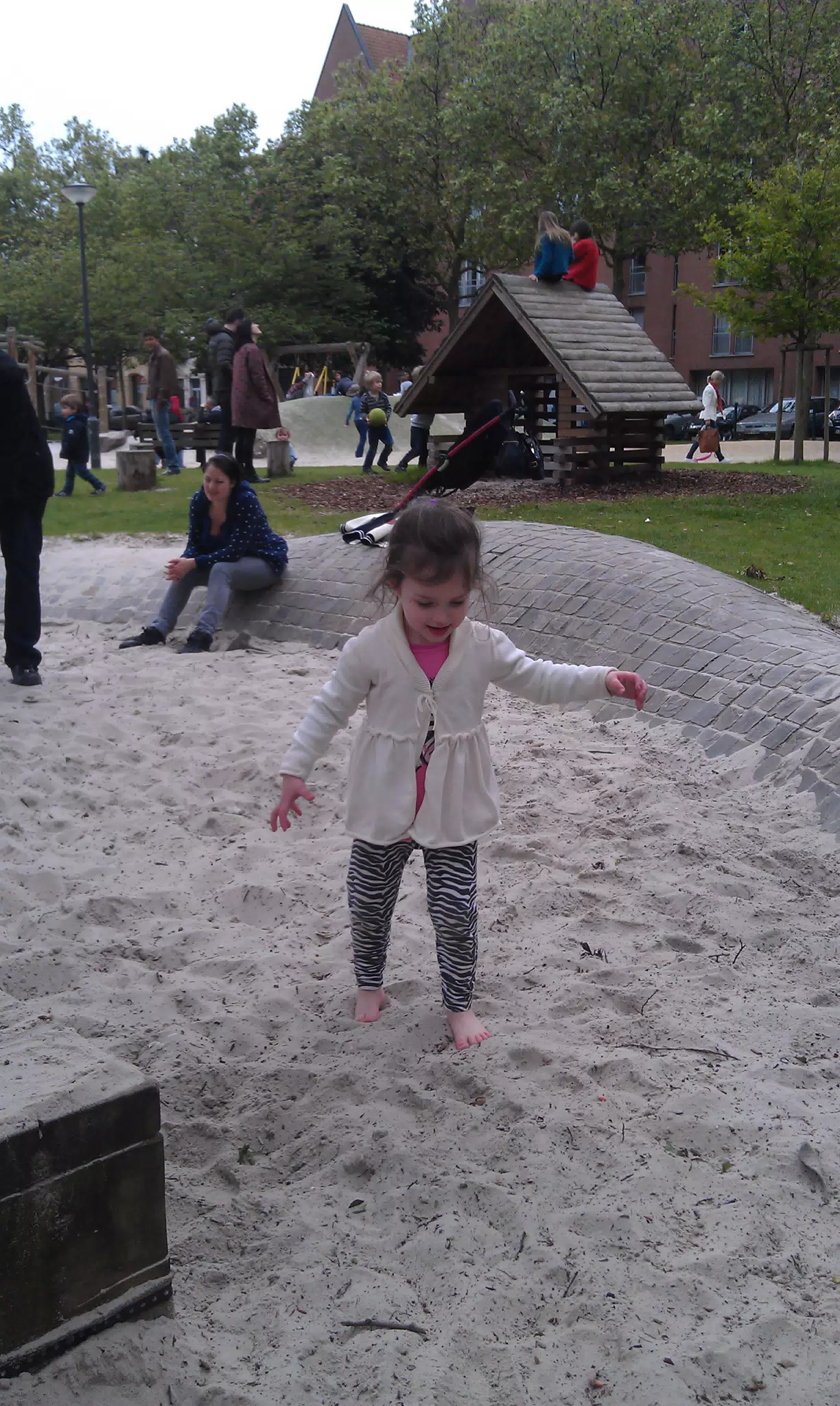 Liesl Playing in Sandbox in Antwerp