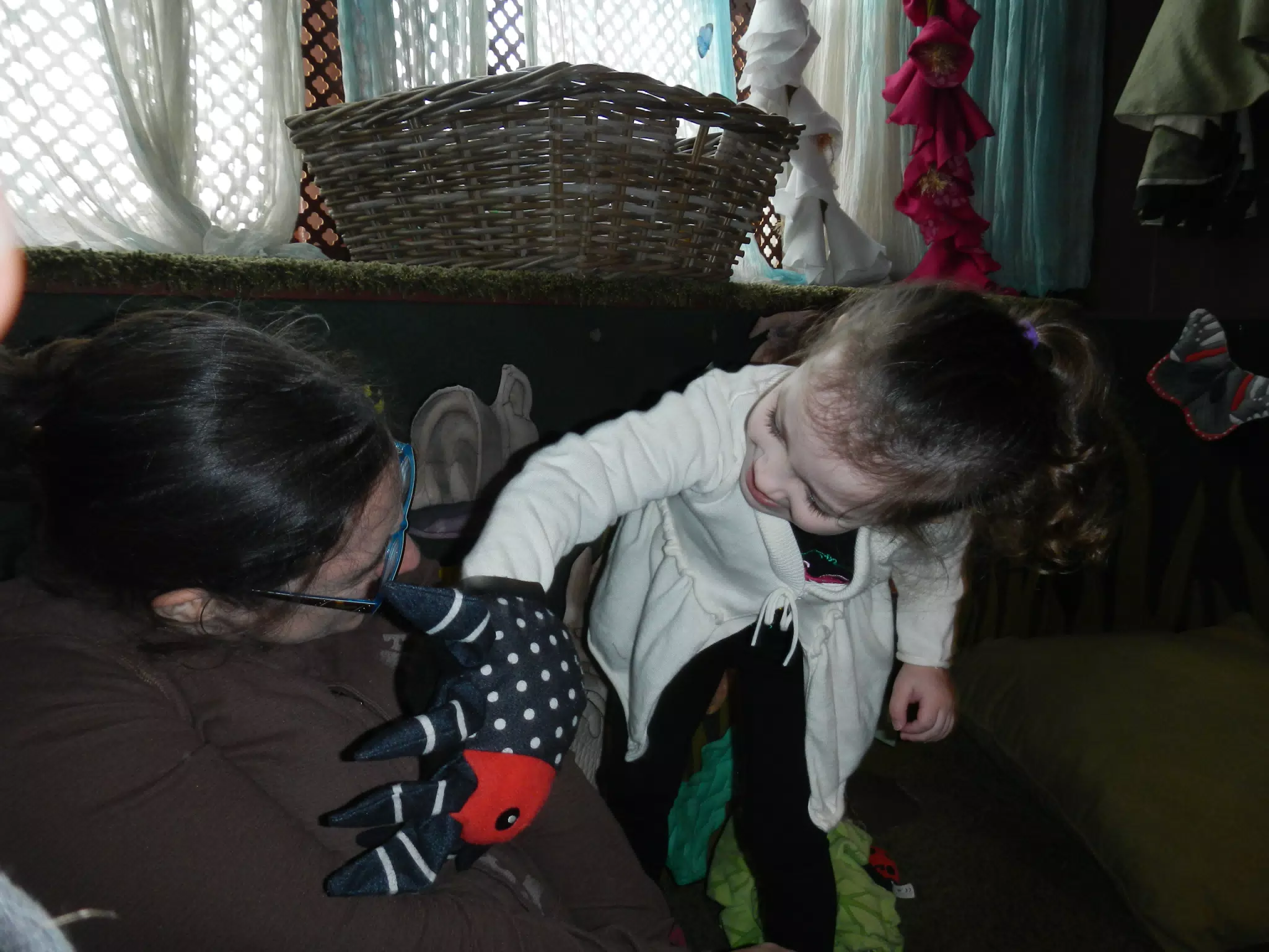 Liesl Attacking Dominica with a Spider Puppet