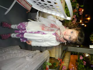 Liesl Dressed in a Scarf for Dinner