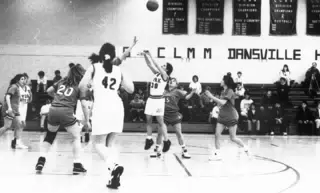 Kim Krywe Shooting a Basket for York Central School