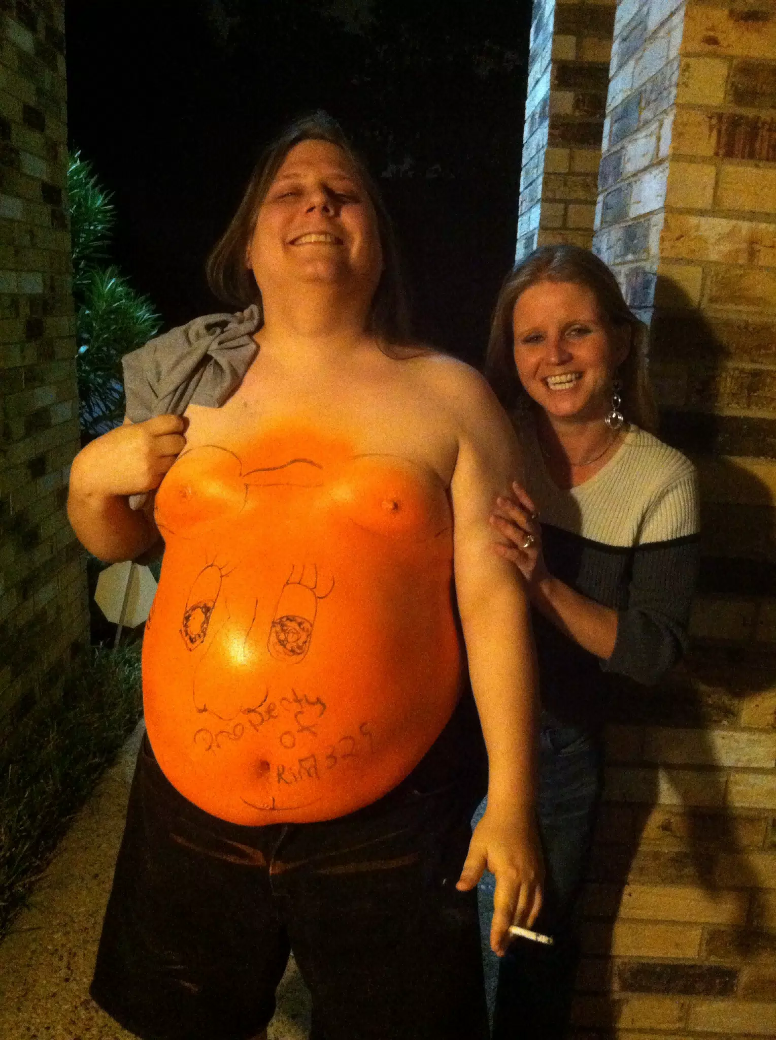 Kim Showing Off Her Artwork