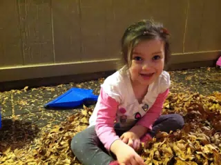 Liesl in the Leaves in the Atrium