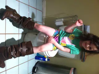 Liesl Trying on Dominica's Boots