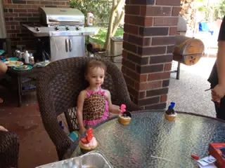 Luciana with Birthday Cupcakes